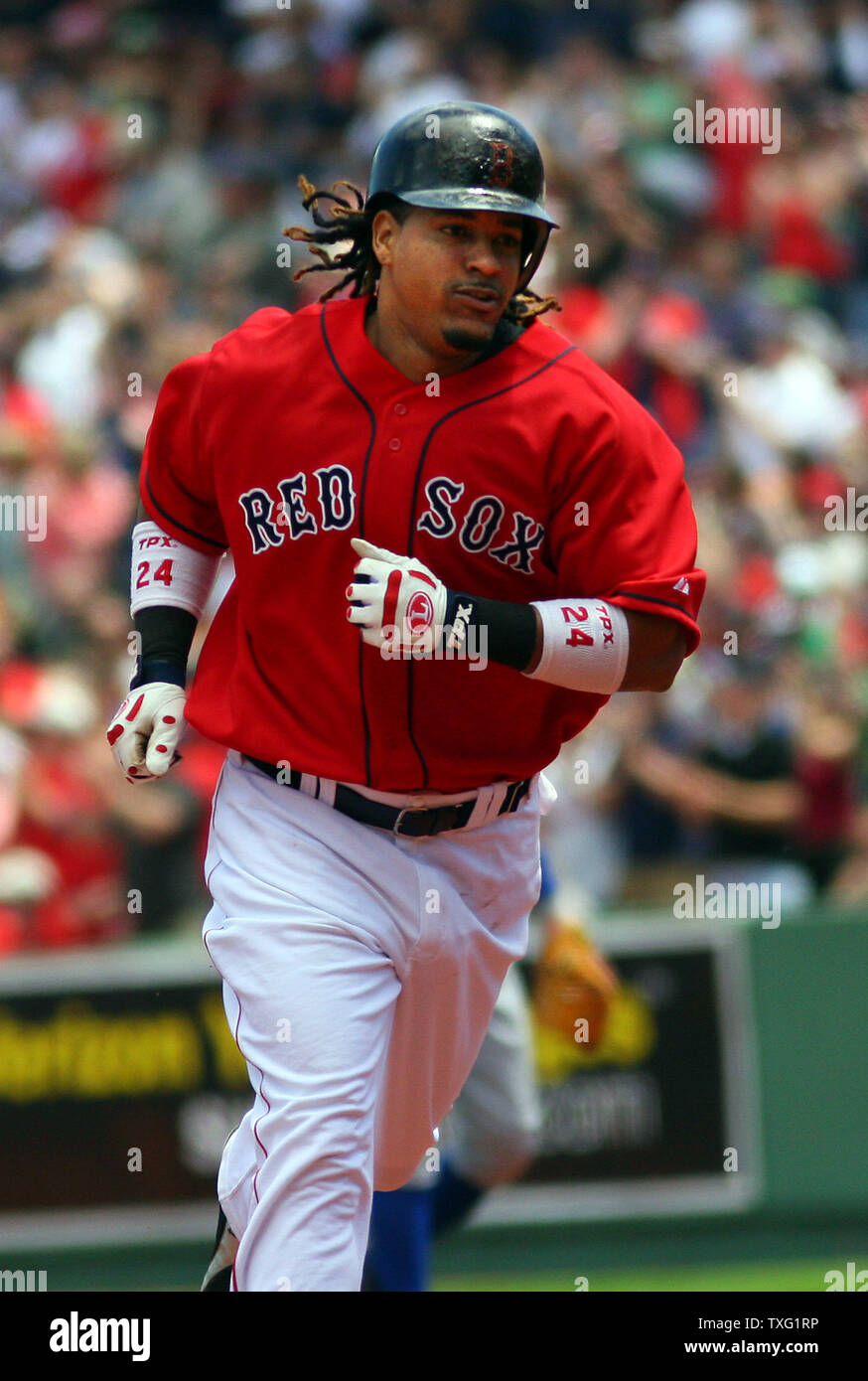 Boston Red Sox left fielder Manny Ramirez rounds the bases during