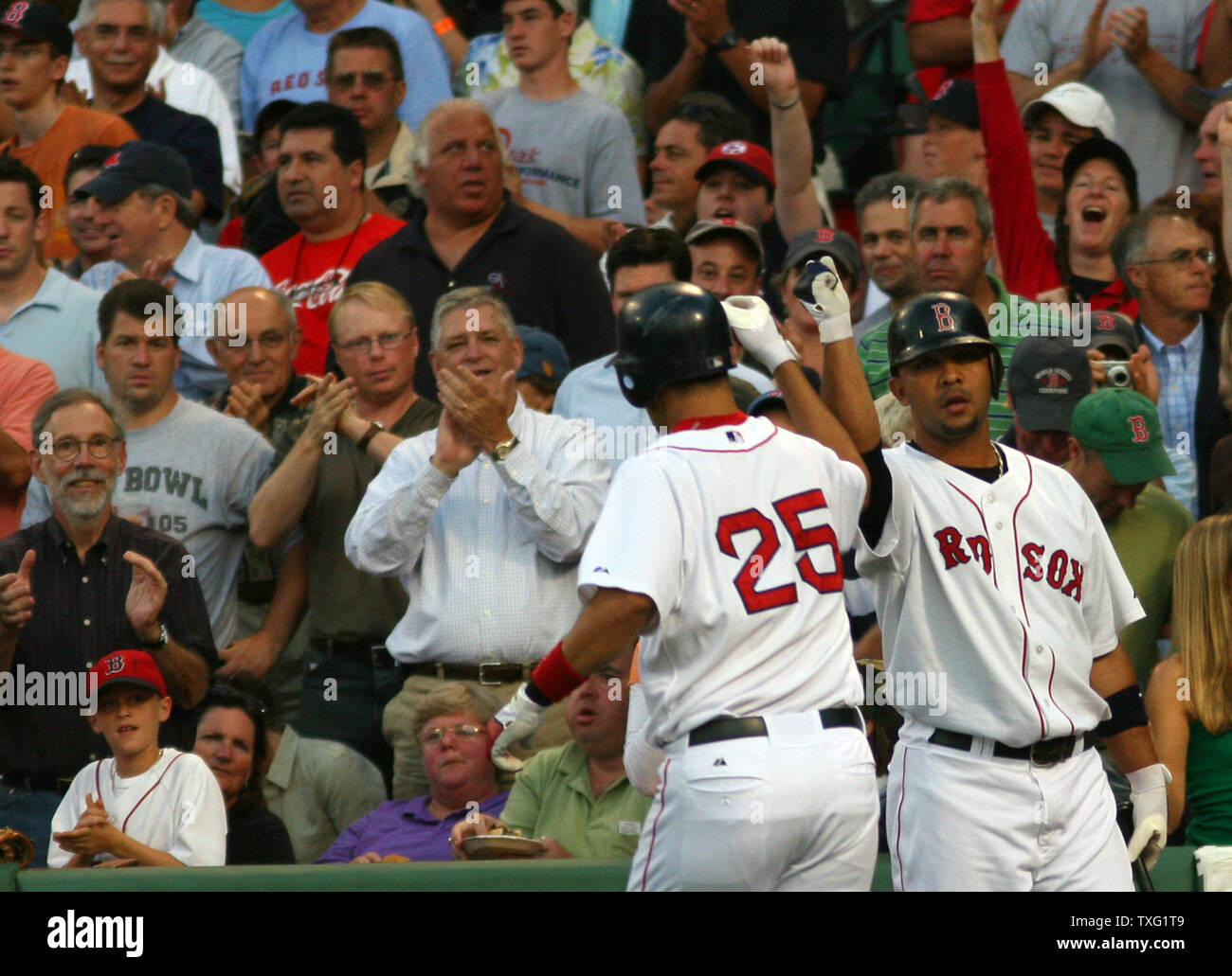 Boston Red Sox Alex Gonzalez congratulates third baseman Mike