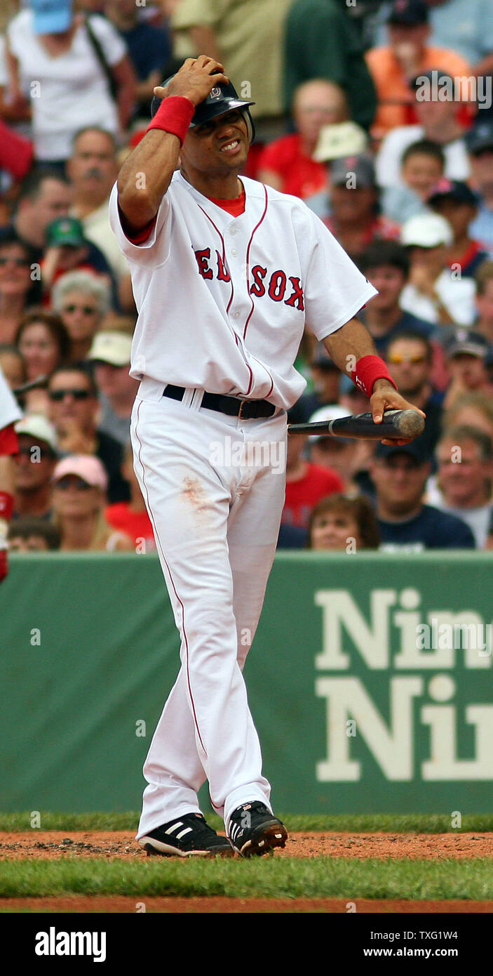 Boston Red Sox center fielder Coco Crisp reacts after missing a bunt  against the Texas Rangers, at Fenway Park in Boston on July 20, 2006. (UPI  Photo/Katie McMahon Stock Photo - Alamy