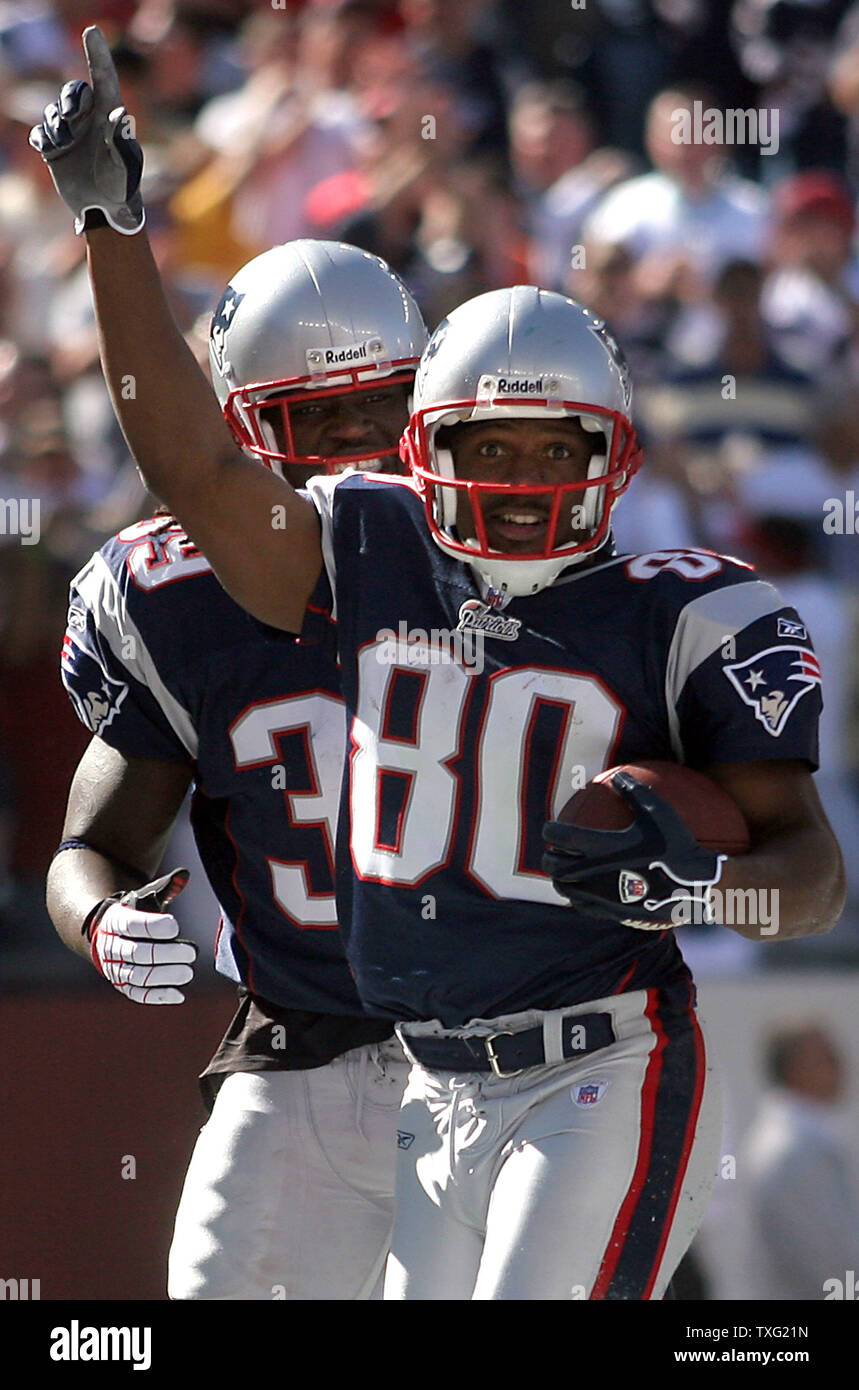 New England Patriots receiver Troy Brown stretches prior to game against  the Denver Broncos during the AFC divisional playoff game at Invesco Field  in Denver on January 14, 2006. (UPI Photo/Gary C.