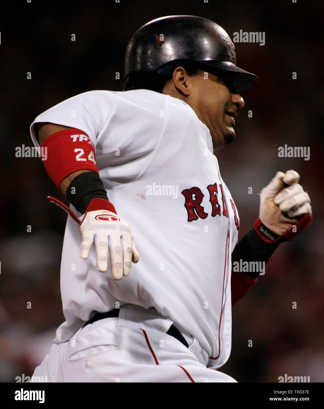 Boston Red Sox left fielder Manny Ramirez rounds the bases during