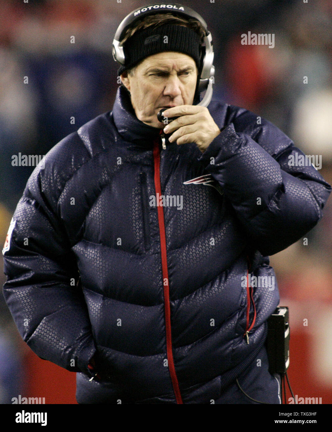 New England Patriots head coach Bill Belichick walks the sidelines in the second quarter against the Pittsburgh Steelers at Gillette Stadium in Foxboro, Massachusetts on December 9, 2007. The Patriots defeated the Steelers 34-13. (UPI Photo/Matthew Healey) Stock Photo