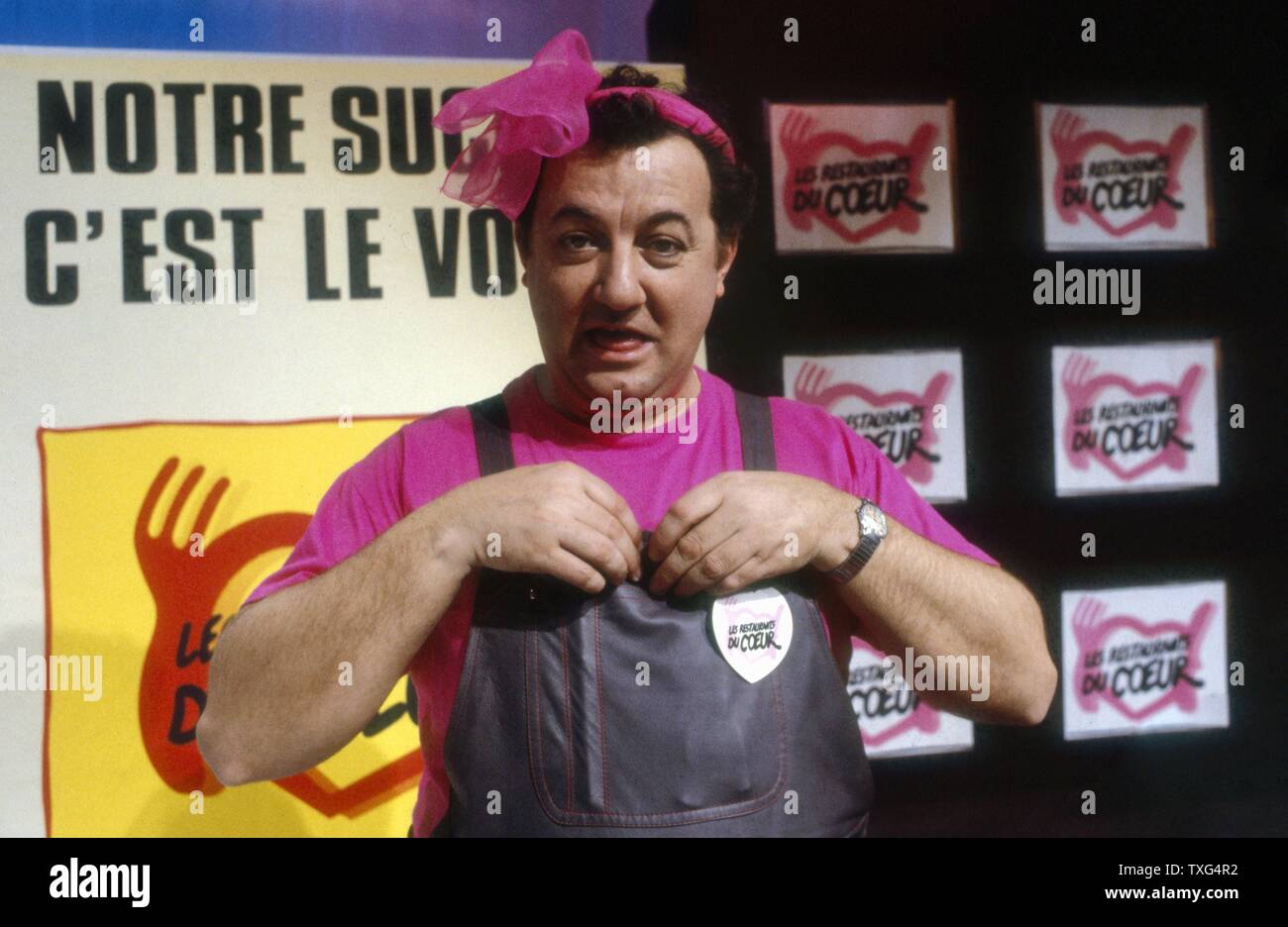Coluche On Tf1 In A Special Tv Show In Support Of The Restos Du Coeur On January 26 1986 Stock Photo Alamy