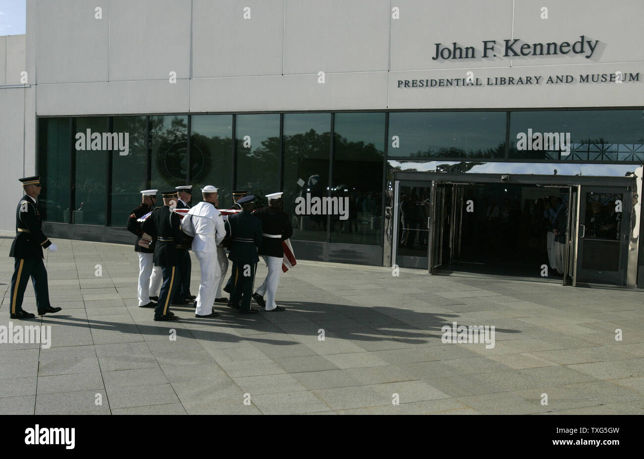 An honor guard carries the casket of Senator Edward Kennedy into the John F. Kennedy Presidential Library and Museum for a wake on August 27, 2009.  Senator Kennedy who passed away late Tuesday night at the age of 77, will lay in repose at the Museum for two days.      UPI/Matthew Healey Stock Photo