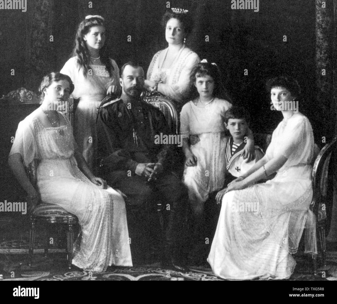 The Russian royal family : Nicholas II and the Tsarina with thier four daughters and their son the Tsarevich. Stock Photo