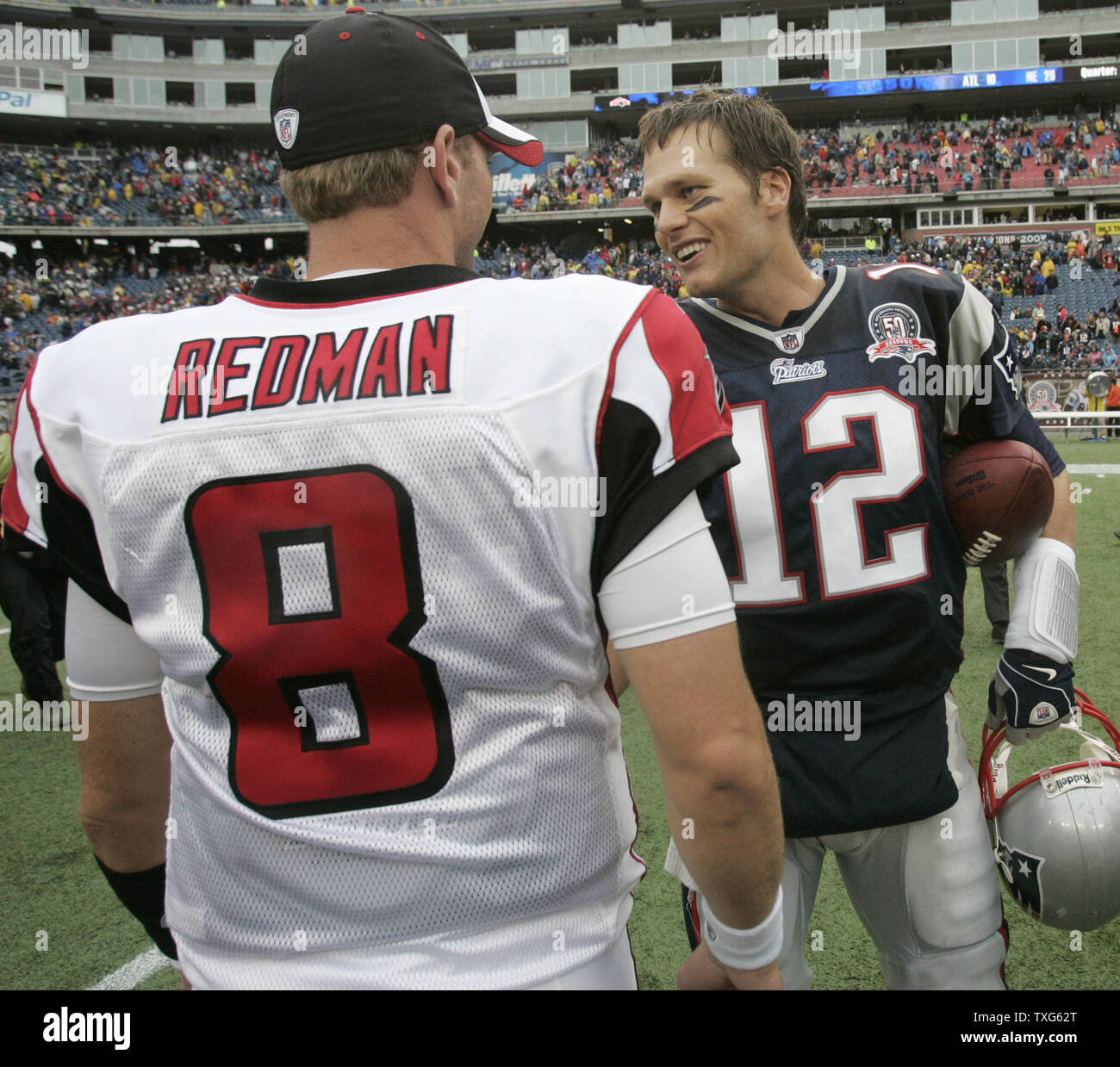 New England Patriots quarterback Tom Brady (12) shakes hands with Atlanta Falcons quarterback Chris Redman (8) after the Patriots defeated the Falcons 26-10 at Gillette Stadium in Foxboro, Massachusetts on September 27, 2009.   UPI/Matthew Healey Stock Photo