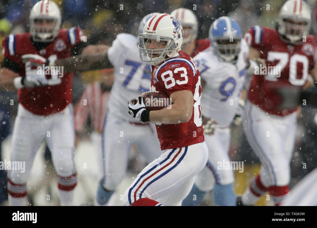 New England Patriots wide receiver Wes Welker (83) runs with the football  during of an NFL football game against the Miami Dolphins Monday Oct. 4,  2010 in Miami. (AP Photo Stock Photo - Alamy