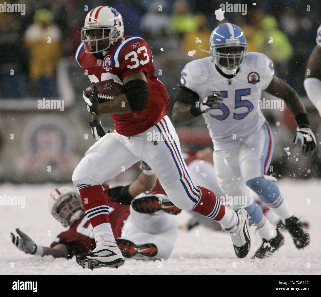 27 September 2009: Tennessee Titans running back #28 Chris Johnson pulls  out. The New York Jets defeated the Tennessee Titans 24-17 at Giants  Stadium in Rutherford, New Jersey. In honor of AFL