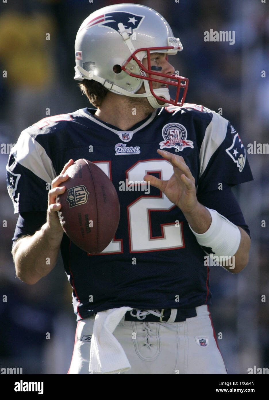 New England Patriots quarterback Tom Brady (12) drops back for a pass against the Miami Dolphins in the first quarter at Gillette Stadium in Foxboro, Massachusetts on November 8, 2009.    UPI/Matthew Healey Stock Photo