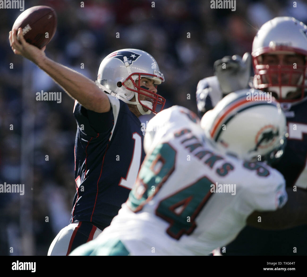New England Patriots quarterback Tom Brady (12) throws in the first quarter against the Miami Dolphins at Gillette Stadium in Foxboro, Massachusetts on November 8, 2009.    UPI/Matthew Healey Stock Photo