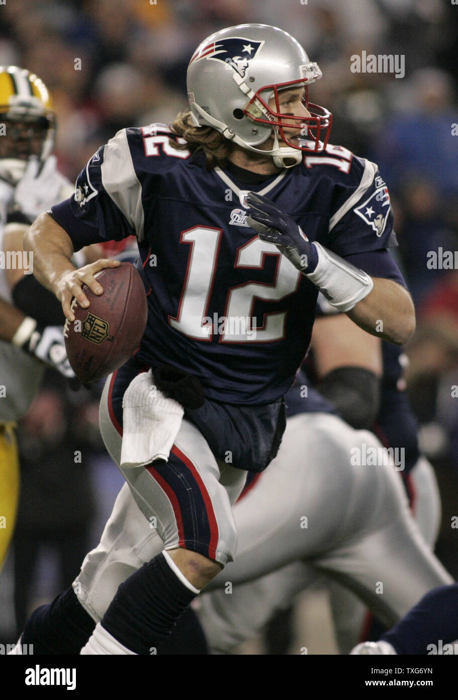 New England Patriots quarterback Tom Brady scrambles out of the pocket in the second quarter against the Green Bay Packers at Gillette Stadium in Foxboro, Massachusetts on December 19, 2010.    UPI/Matthew Healey Stock Photo