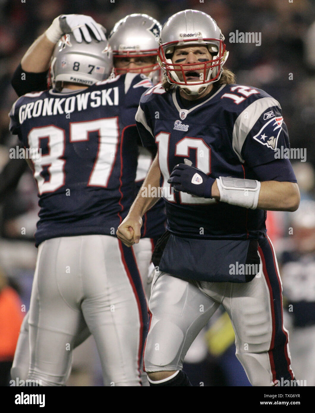 New England Patriots quarterback Tom Brady (12) gives a hug to running back  BenJarvus Green-Ellis after his13-yard touchdown carry in the third quarter  against the Minnesota Vikings at Gillette Stadium in Foxboro