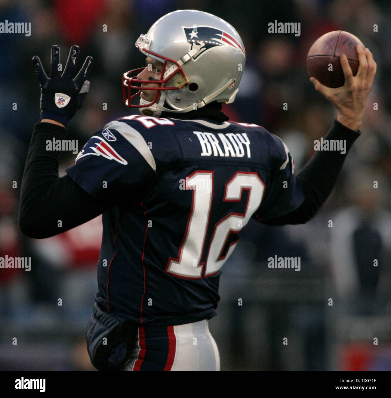 New England Patriots quarterback Tom Brady throws a pass during warm ups before the AFC division playoff game against the New York Jets at Gillette Stadium in Foxboro, Massachusetts on January 16, 2011.    UPI/Matthew Healey Stock Photo