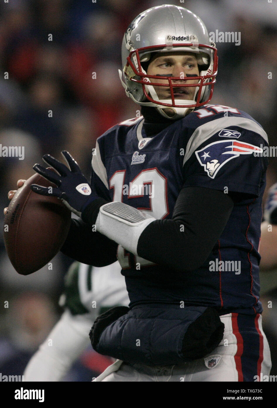 New England Patriots quarterback Tom Brady drops back for a pass in the first quarter of the AFC division playoff game against the New York Jets at Gillette Stadium in Foxboro, Massachusetts on January 16, 2011.    UPI/Matthew Healey Stock Photo