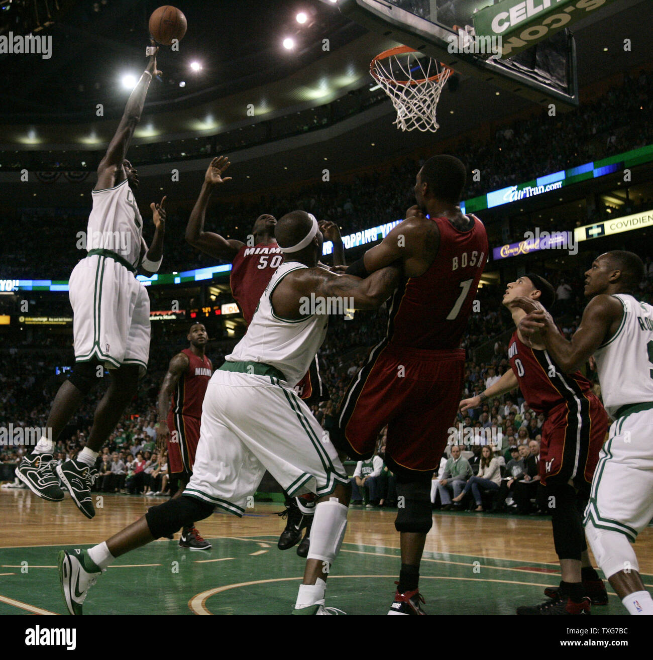 Boston Celtics forward Kevin Garnett (L) goes up for two points against the Miami Heat in the second half of the Eastern Conference Semifinals at the TD Garden in Boston, Massachusetts on May 7, 2011.   UPI/Matthew Healey Stock Photo