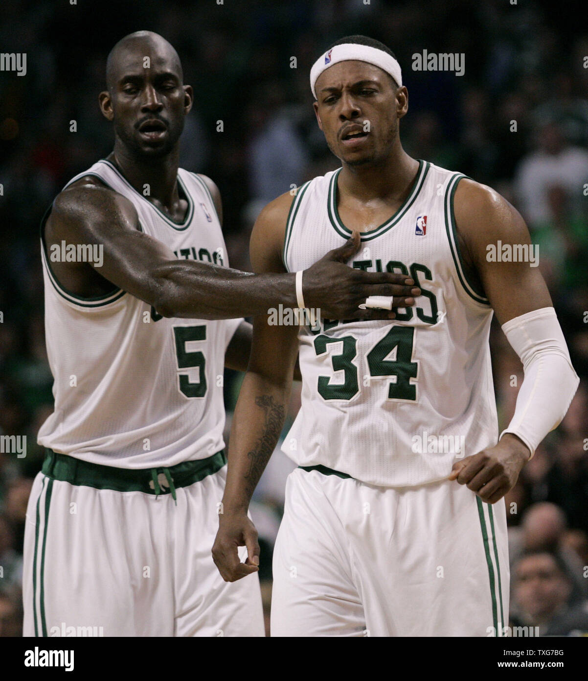 Boston Celtics forward Kevin Garnett (5) pats teammate forward Paul Pierce (34) on the chest after a play against the Miami Heat in the second half of the Eastern Conference Semifinals at the TD Garden in Boston, Massachusetts on May 7, 2011.   UPI/Matthew Healey Stock Photo