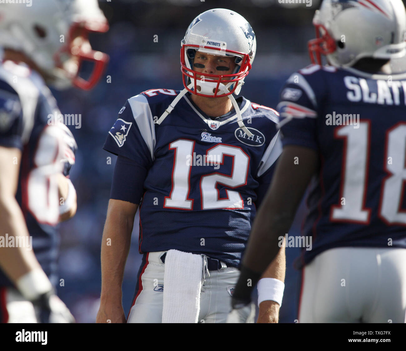 New England Patriots quarterback Tom Brady (12) calls a play to the offense while warming up before the game against the San Diego Chargers at Gillette Stadium in Foxboro, Massachusetts on September 18, 2011.  UPI/Matthew Healey Stock Photo