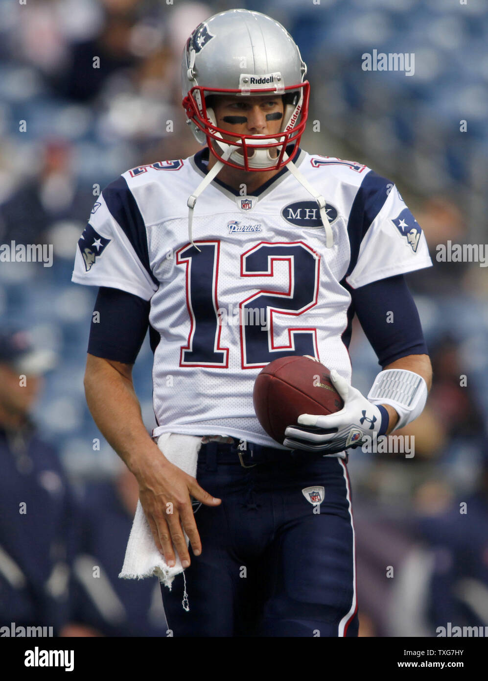 New England Patriots quarterback Tom Brady warms up with teammates before the game against the Dallas Cowboys at Gillette Stadium in Foxboro, Massachusetts on October 16, 2011.    UPI/Matthew Healey Stock Photo