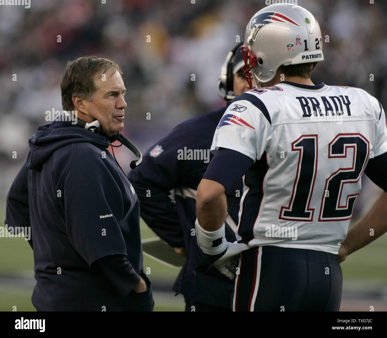 New England Patriots head coach Bill Belichick (L) chats with quarterback Tom Brady in the second quarter against the Dallas Cowboys at Gillette Stadium in Foxboro, Massachusetts on October 16, 2011.    UPI/Matthew Healey Stock Photo