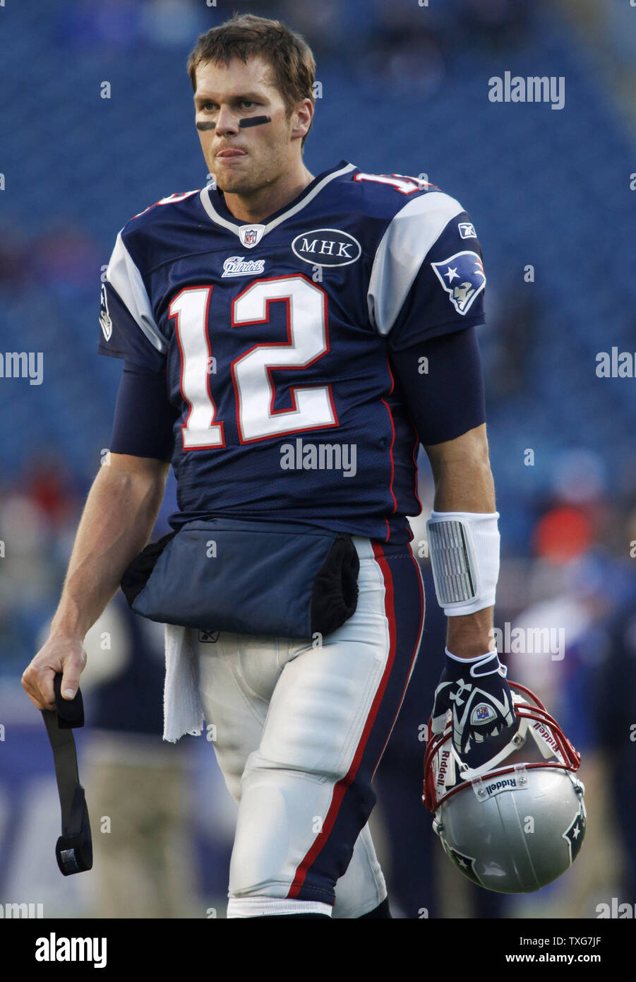 New England Patriots quarterback Tom Brady walks the field while warming up with his team before taking on the New York Giants at Gillette Stadium in Foxboro, Massachusetts on November 6, 2011.    UPI/Matthew Healey Stock Photo
