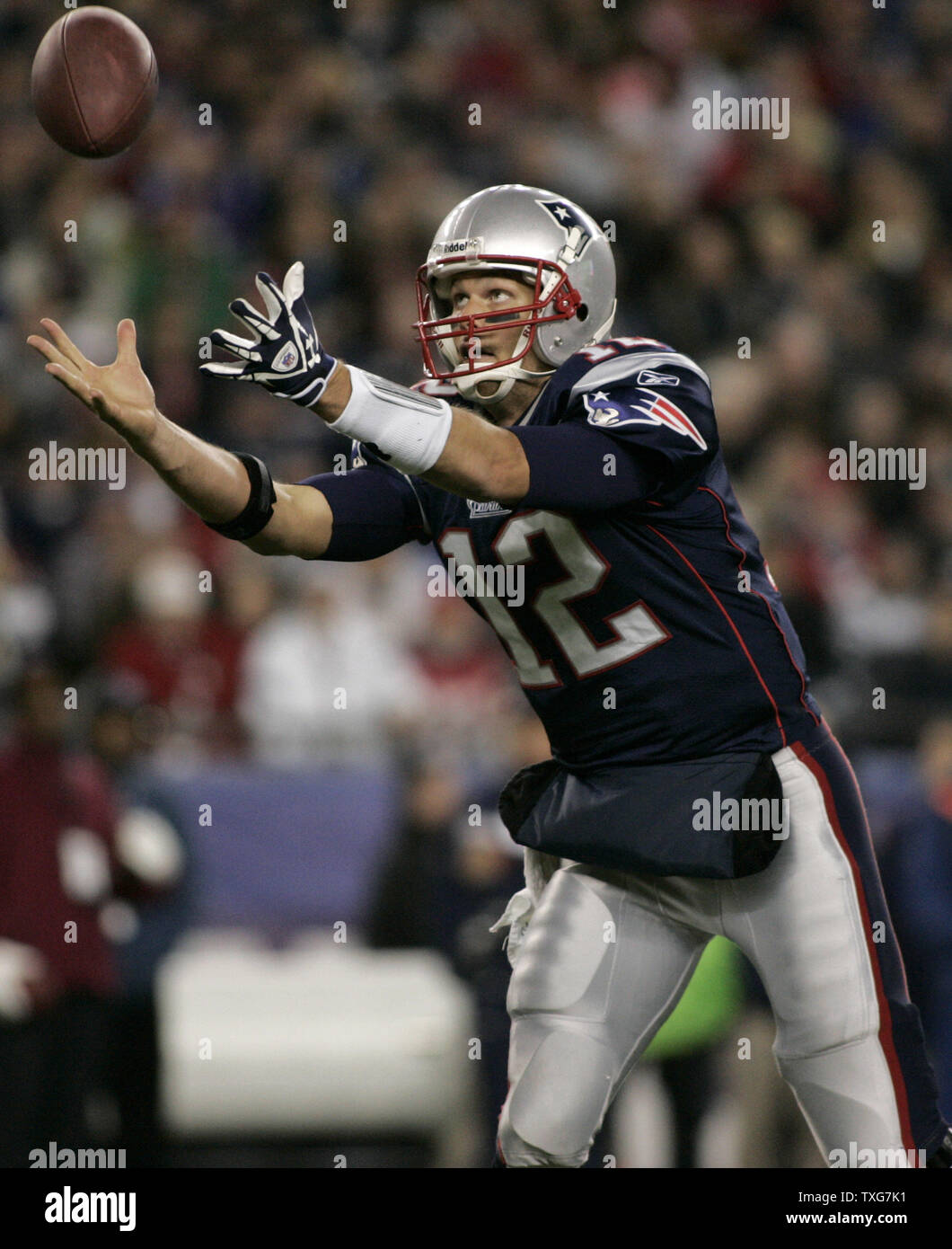 New England Patriots quarterback Tom Brady chases after a bad snap in the second quarter against the New York Giants at Gillette Stadium in Foxboro, Massachusetts on November 6, 2011.  The Giants defeated the Patriots 24-20.   UPI/Matthew Healey Stock Photo