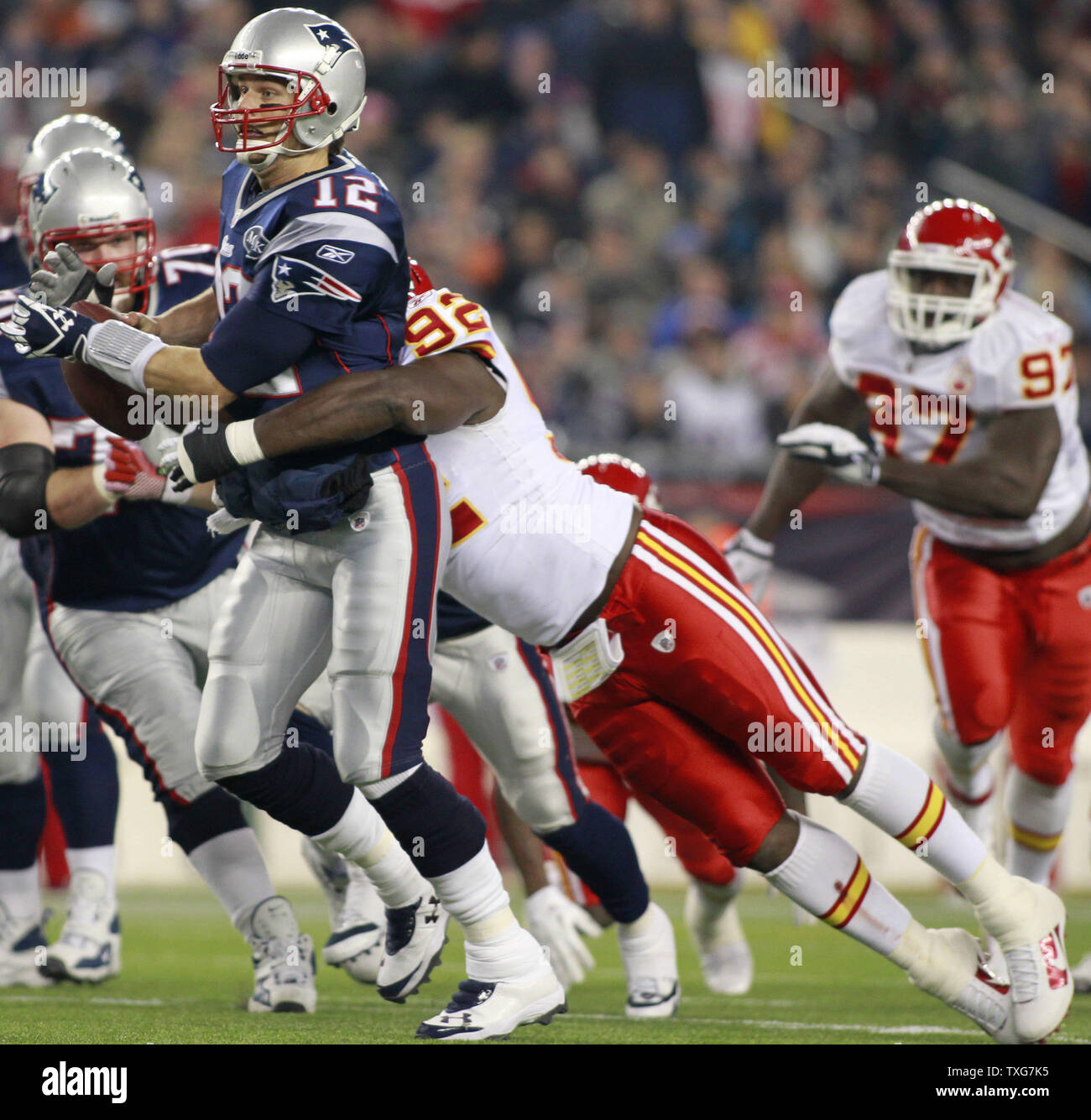New England Patriots quarterback Tom Brady (12) is sacked by Kansas City Chiefs defensive end Wallace Gilberry in the second quarter at Gillette Stadium in Foxboro, Massachusetts on November 21, 2011.    UPI/Matthew Healey Stock Photo