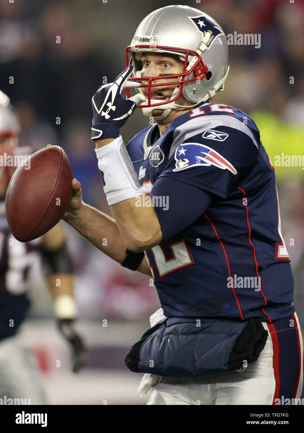 New England Patriots quarterback Tom Brady rolls out for a pass in the fourth quarter against the Kansas City Chiefs at Gillette Stadium in Foxboro, Massachusetts on November 21, 2011.  The Patriots defeated the Chiefs 34-3.   UPI/Matthew Healey Stock Photo
