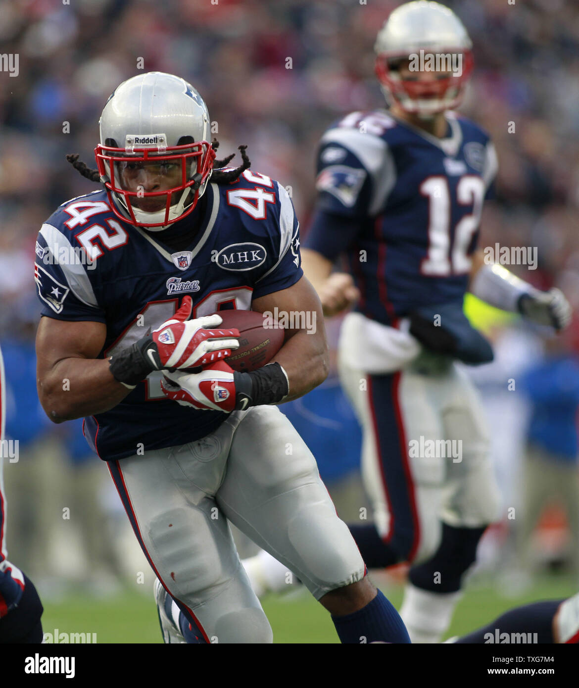 New England Patriots quarterback Tom Brady (12) gives a hug to running back  BenJarvus Green-Ellis after his13-yard touchdown carry in the third quarter  against the Minnesota Vikings at Gillette Stadium in Foxboro