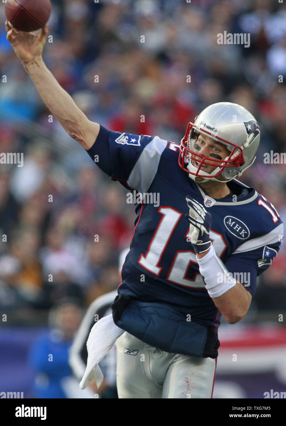 New England Patriots quarterback Tom Brady (12) throws a pass in the second quarter against the Indianapolis Colts at Gillette Stadium in Foxboro, Massachusetts on December 4, 2011.     UPI/Matthew Healey Stock Photo