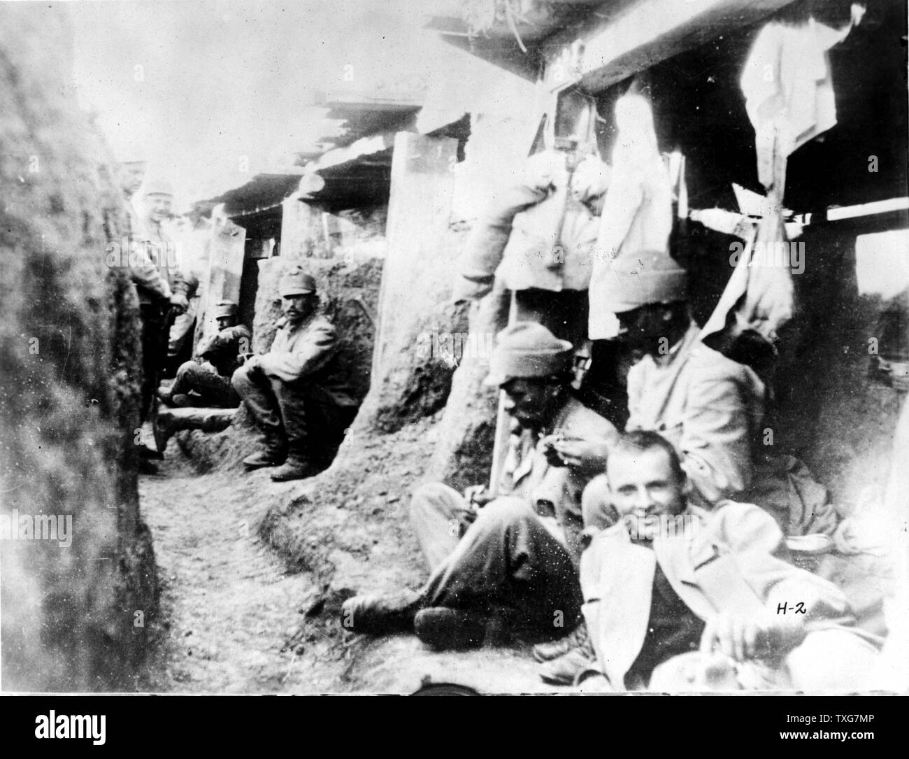 World War I   :  German soldiers relaxing in their  trench during a lull in fighting Stock Photo