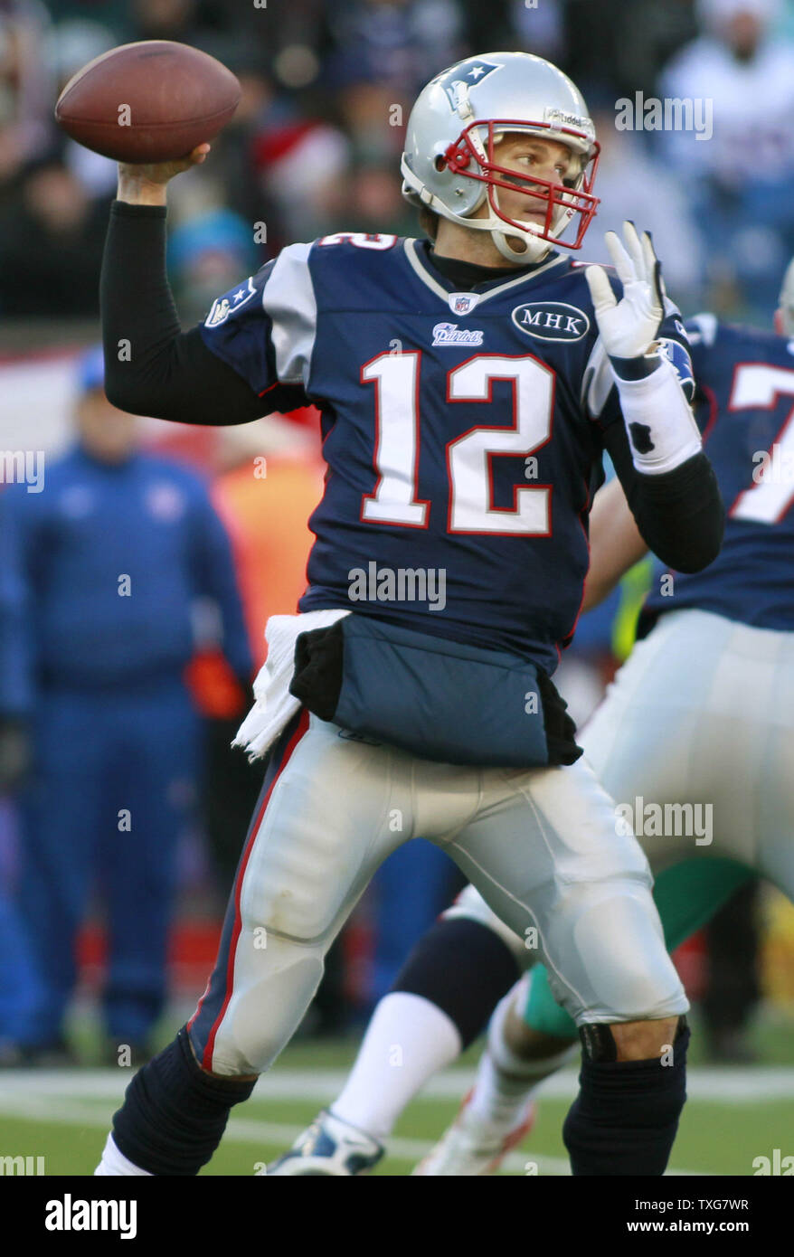 New England Patriots quarterback Tom Brady throws a pass in the second quarter against the Miami Dolphins at Gillette Stadium in Foxboro, Massachusetts on December 24, 2011.  UPI/Matthew Healey Stock Photo