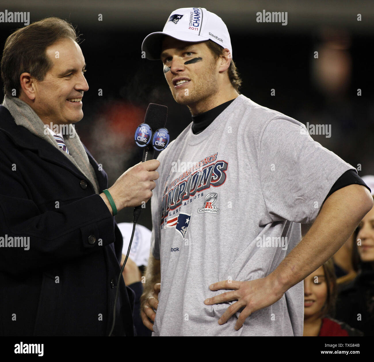 New England Patriots quarterback Tom Brady (R) chats with Jim Nantz after the Patriots defeated the Ravens in the AFC Championship game at Gillette Stadium in Foxboro, Massachusetts on January 22, 2012.   UPI/Matthew Healey Stock Photo