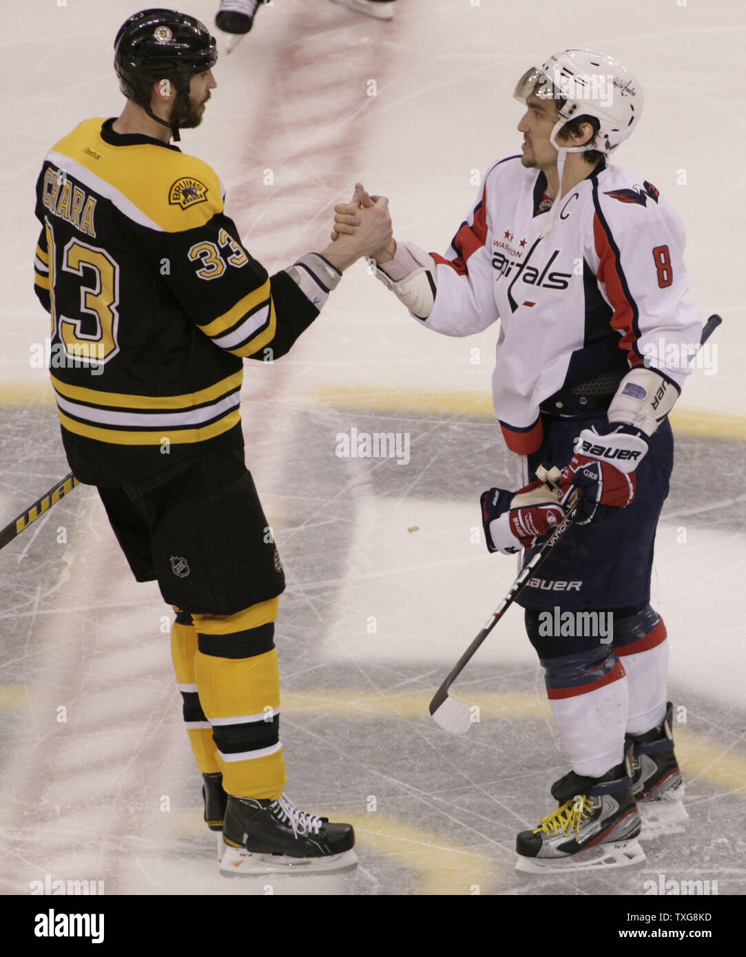 Washington Capitals' Alex Ovechkin (8) shakes hands with