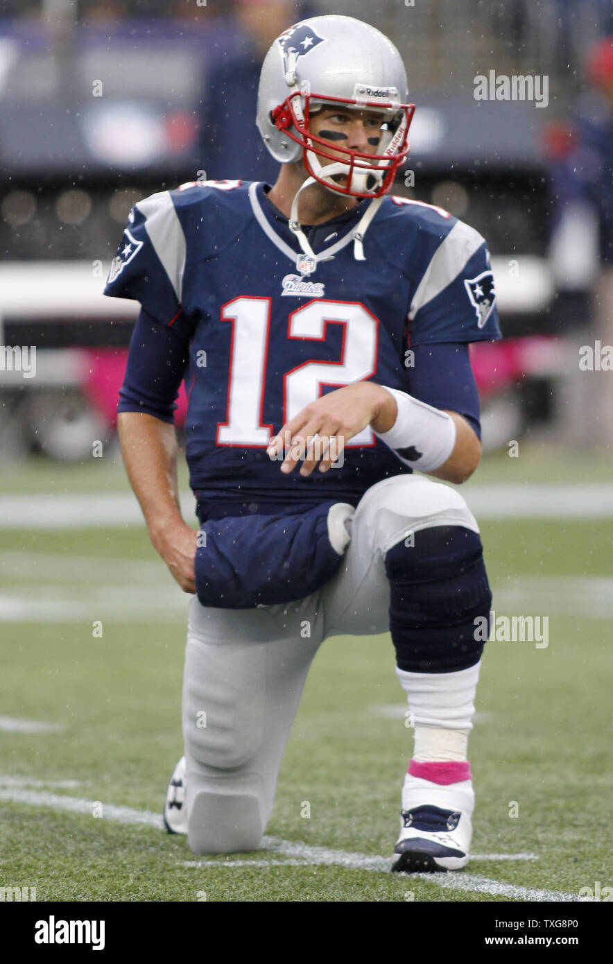 New England Patriots quarterback Tom Brady stretches with his team before the game against the Denver Broncos at Gillette Stadium in Foxboro, Massachusetts on October 7, 2012.  UPI/Matthew Healey Stock Photo
