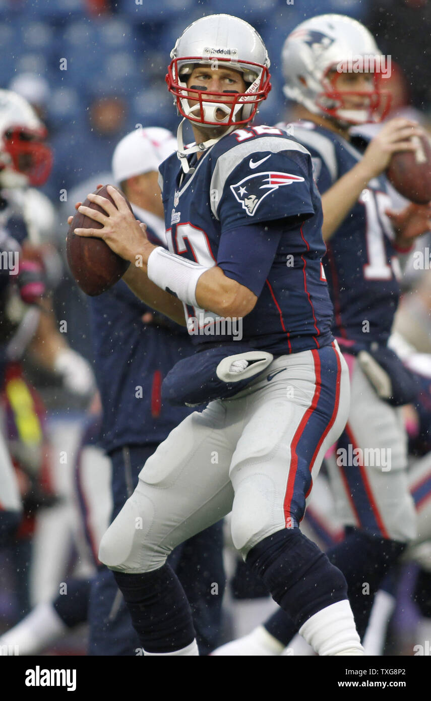 New England Patriots quarterback Tom Brady throws a pass while warming up before the game against the Denver Broncos at Gillette Stadium in Foxboro, Massachusetts on October 7, 2012.  UPI/Matthew Healey Stock Photo