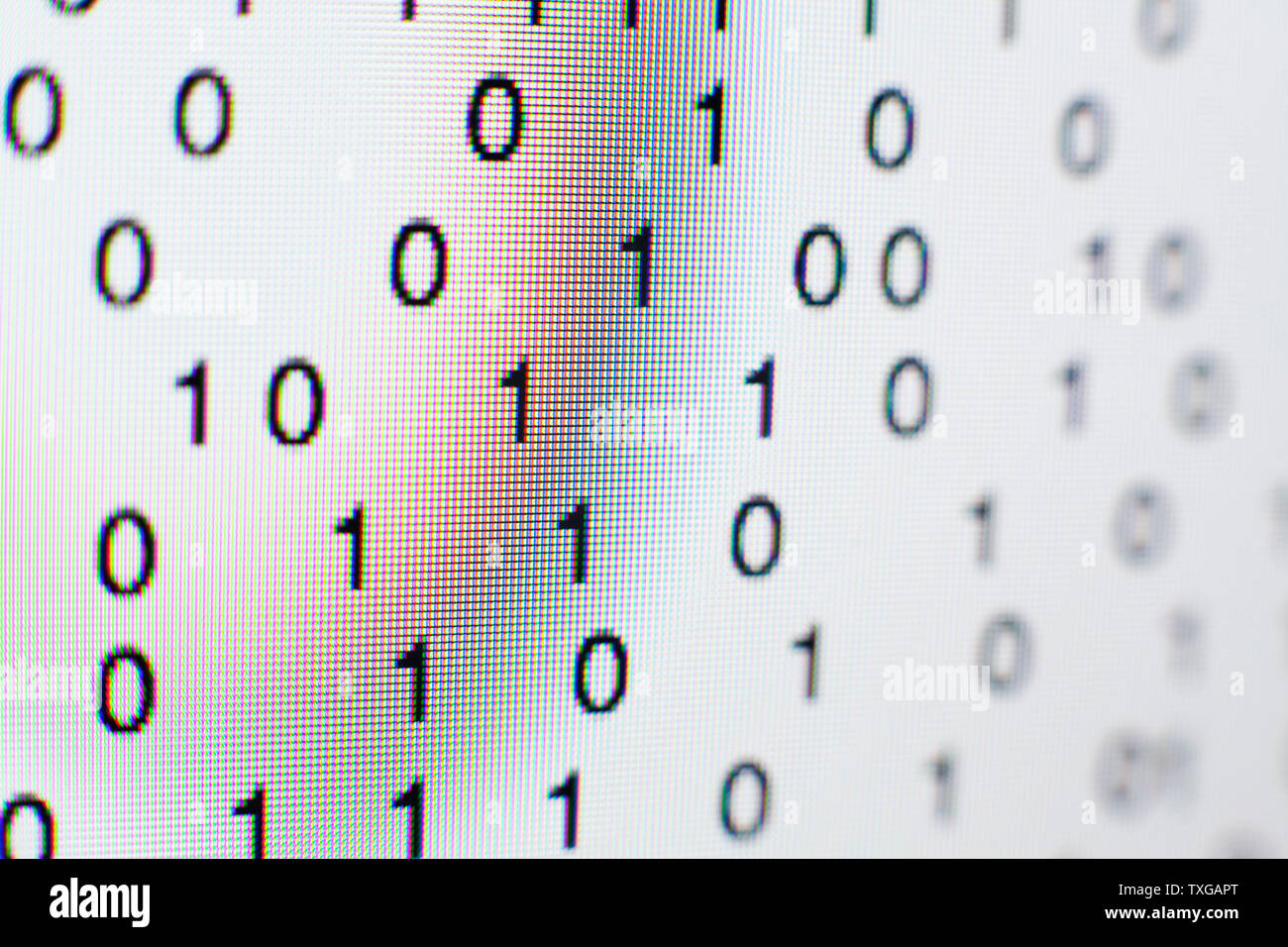 Binary code on a computer screen Stock Photo