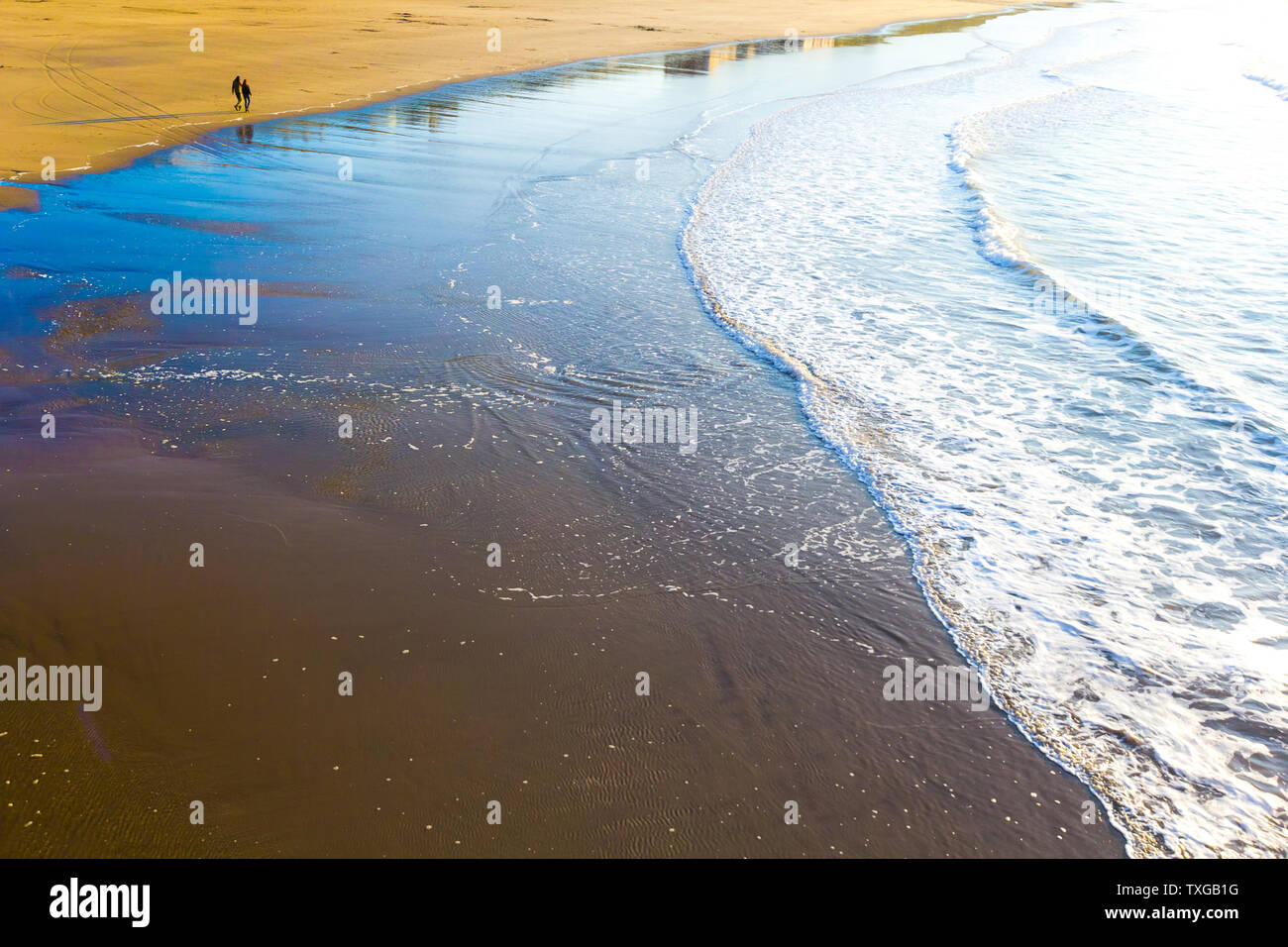 Sand and waves in Whitby Stock Photo