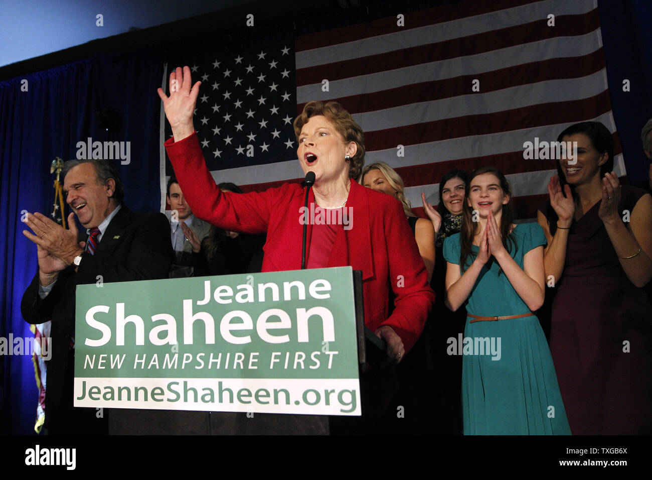 Jeanne Shaheen, incumbent Democratic U.S. Senator in New Hampshire, raises her hands to celebrate her midterm election win over Republican candidate Scott Brown at her election night rally at the Puritan Convention Center in Manchester, New Hampshire on November 4, 2014.    UPI/Matthew Healey Stock Photo