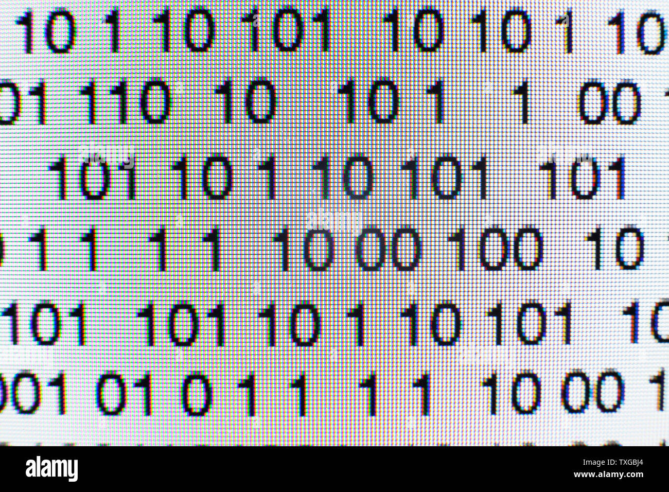 Binary code on a computer screen Stock Photo