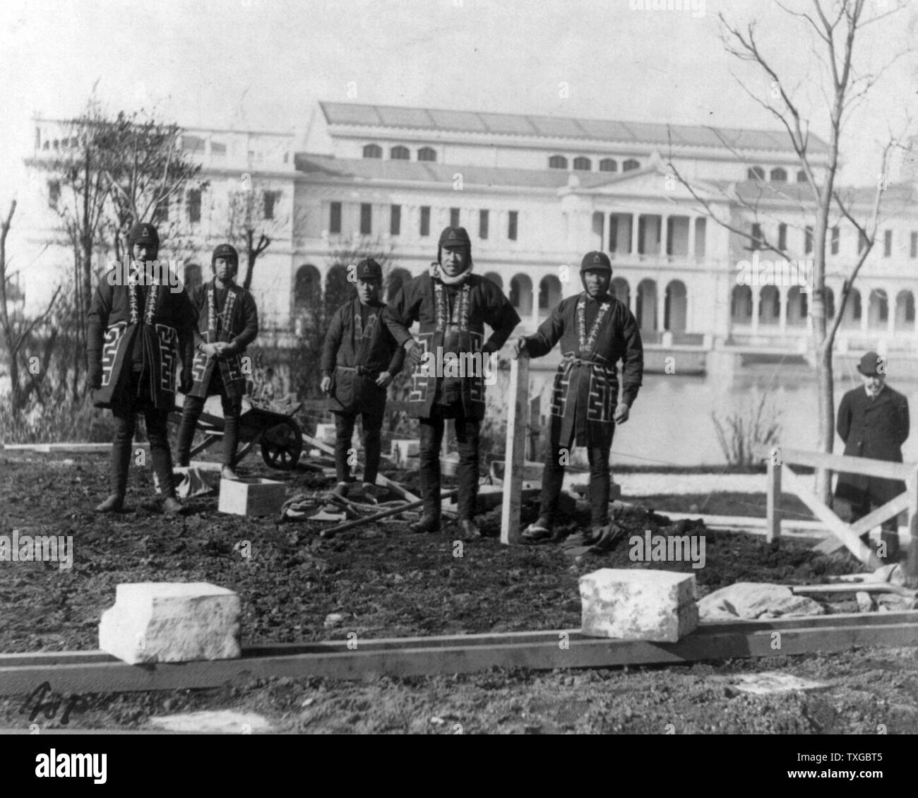 Japanese carpenters and stone masons in distinctive native attire starting to construct Japanese Pavilion at World Columbian Exposition, Chicago, 1893: posed on site of construction Stock Photo