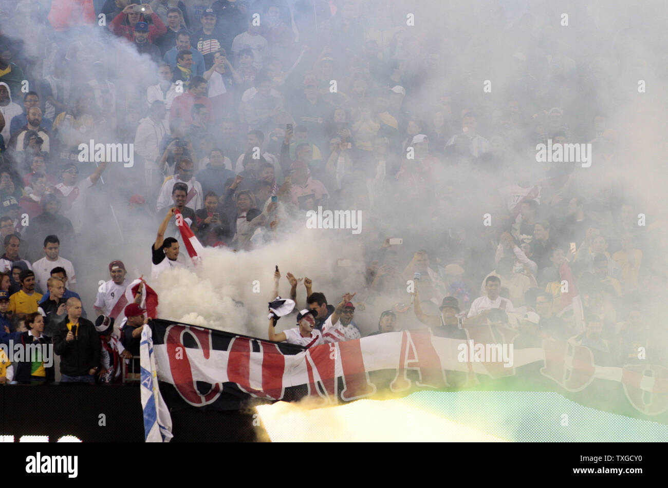 Peru fans set off a smoke grenade during the 2016 Copa America Centenario Group B match against Brazil at Gillette Stadium in Foxborough, Massachusetts on June 12, 2016.  Photo by Matthew Healey/UPI Stock Photo