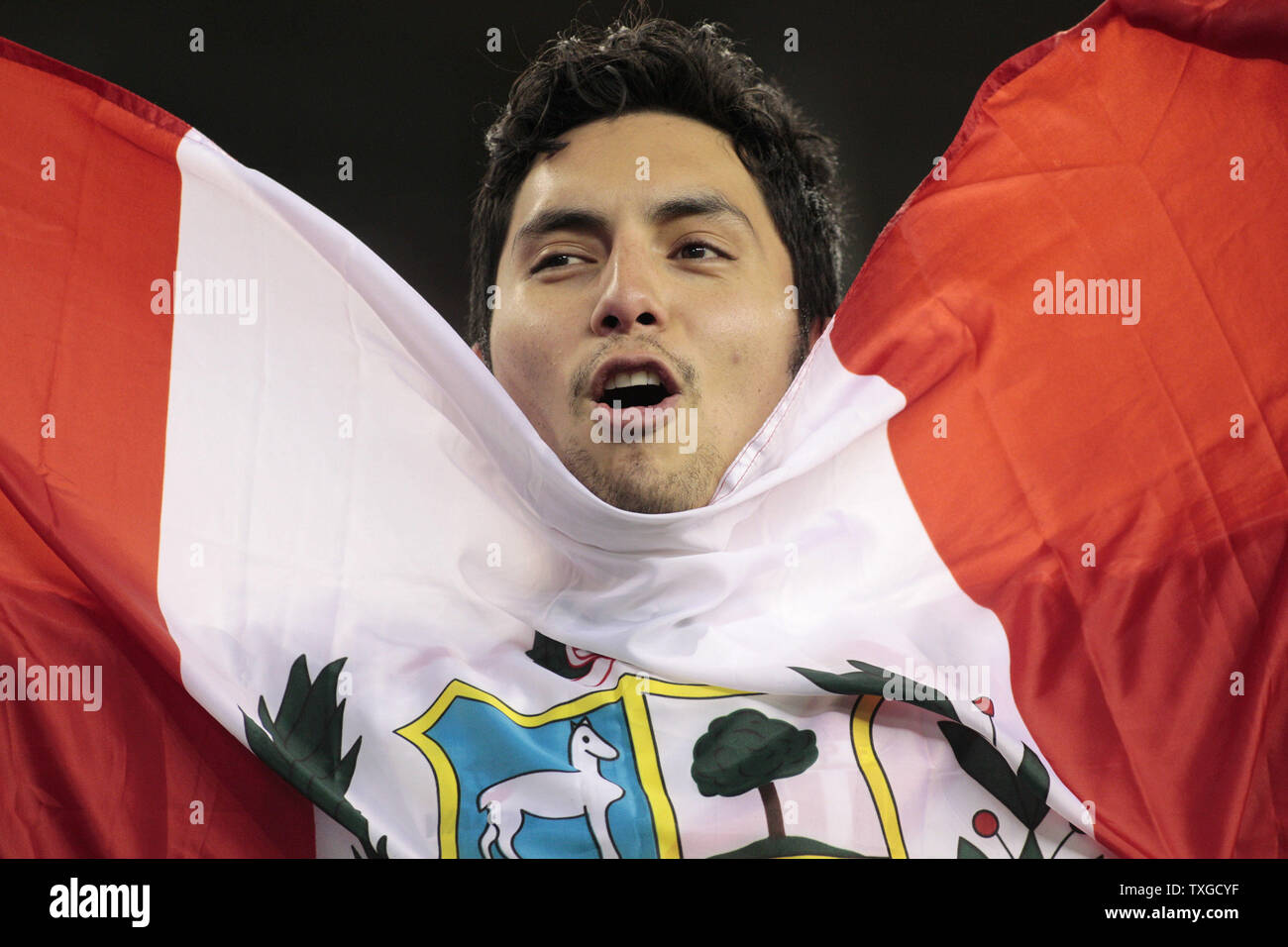 A Peru fan cheers for his team after they defeated Brazil in the 2016 Copa America Centenario Group B match at Gillette Stadium in Foxborough, Massachusetts on June 12, 2016. Peru defeated Brazil 1-0.  Photo by Matthew Healey/UPI Stock Photo