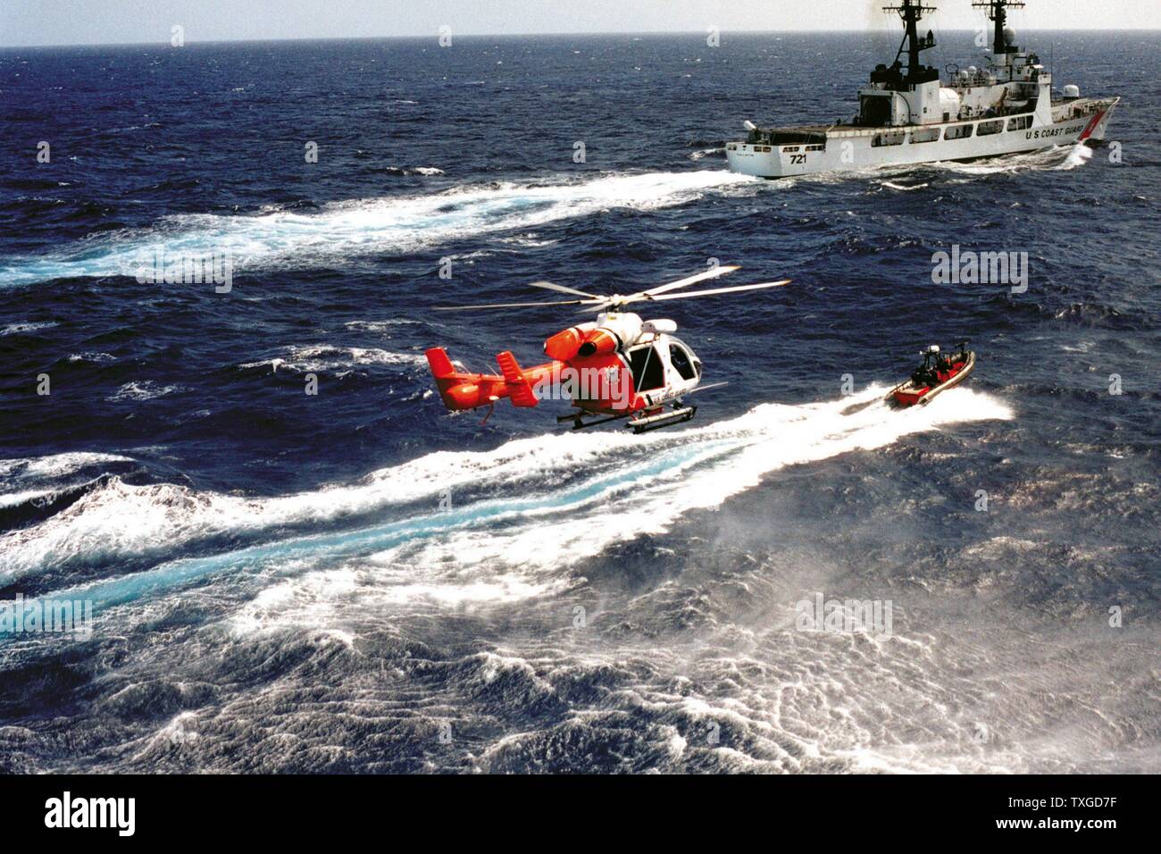Us coastguard patrol boat dinghy helicopter hi-res stock photography ...