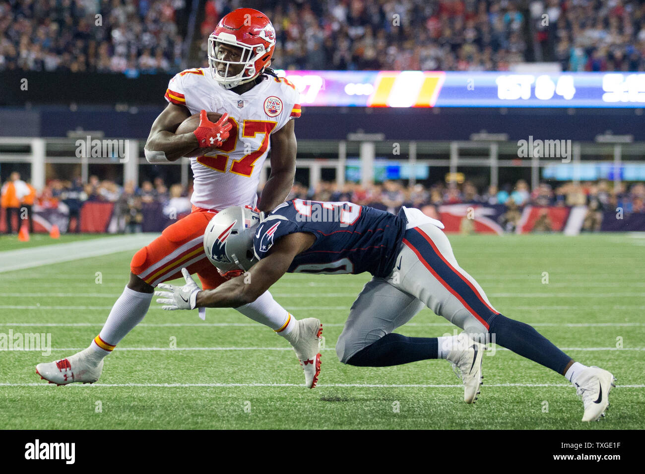 Illinois, USA. 25 August 2018. Chiefs #27 Kareem Hunt is tackled