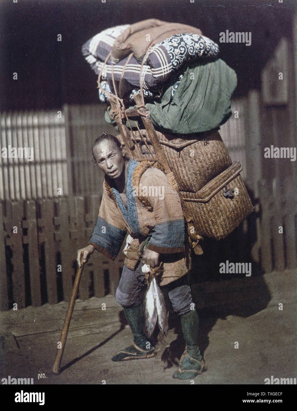 Hand-coloured photograph of Japanese man by Felice Beato (1832-1909) Italian-British photographer. Dated 1869 Stock Photo