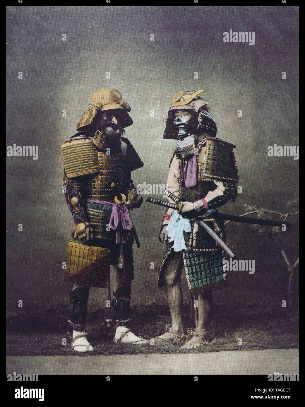 Hand-coloured photograph of Japanese men by Felice Beato (1832-1909) Italian-British photographer. Dated 1869 Stock Photo