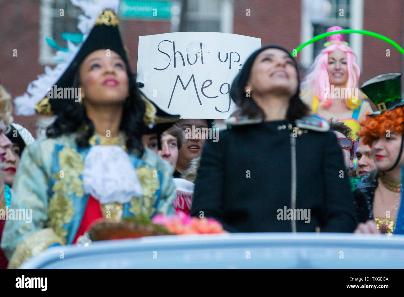 A Fan Of The Cartoon Family Guy Holds Up A Sign Referencing The Character Meg Voiced A Fan Of The Cartoon Family Guy Holds Up A Sign Referencing The Character Meg Voiced