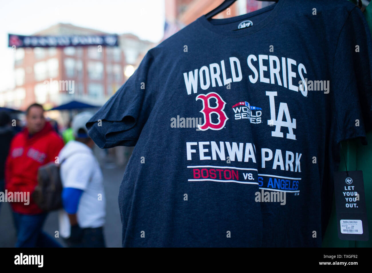 A vendor displays t-shirts on Jersey Street prior to the start of