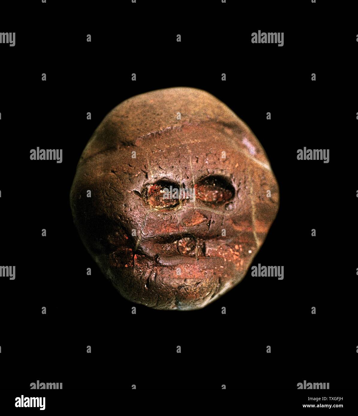 earliest recorded human made, artistic object. A pebble resembling a human face, from Makapansgat, South Africa, ca. 3,000,000 BCE Discovered in 1925 Stock Photo