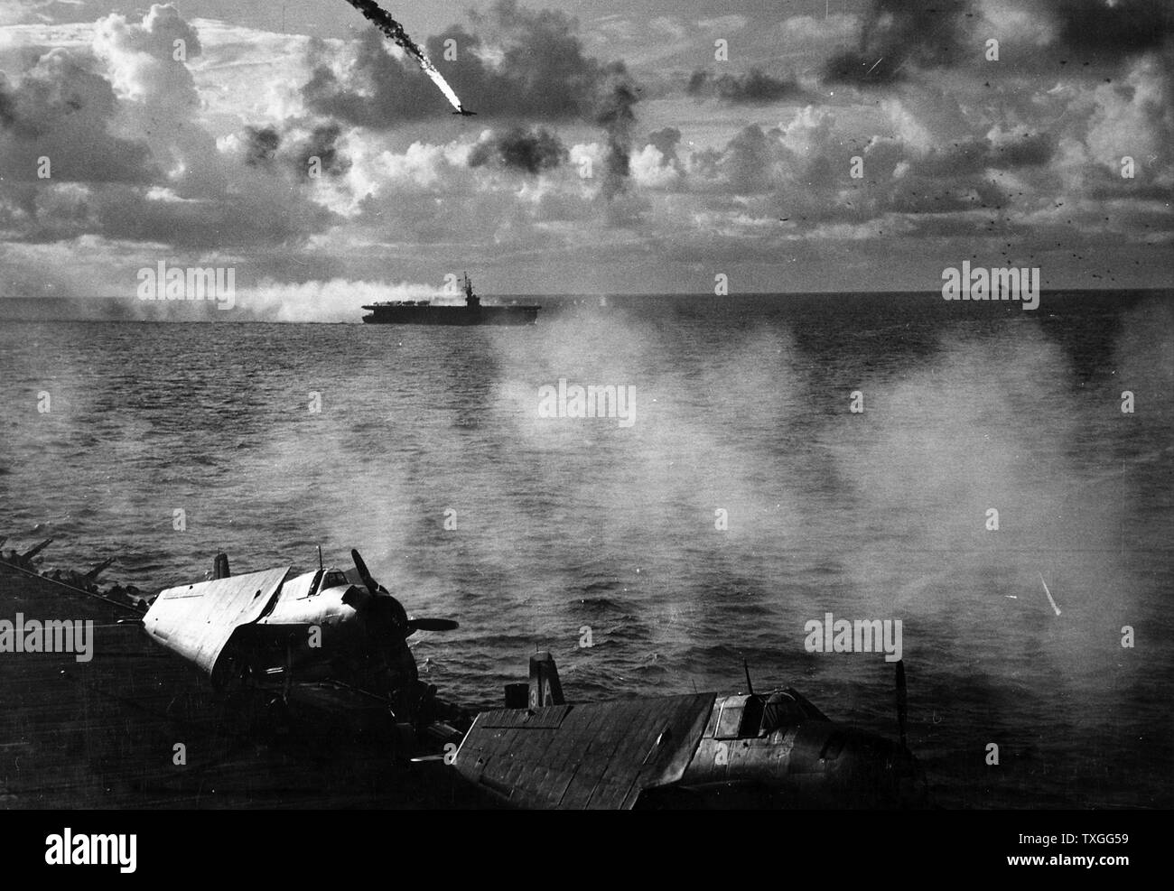 World war two: Japanese plane is shot down while attempting a suicide attack on the USS Kitkun Bay 1 January 1945. Stock Photo